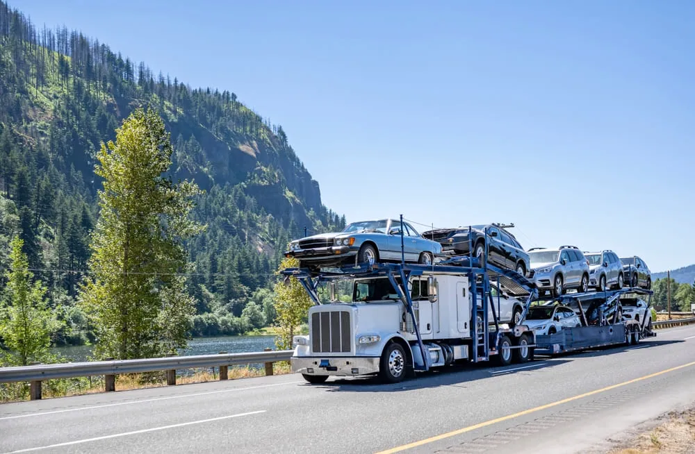 Truck transporting cars on a highway