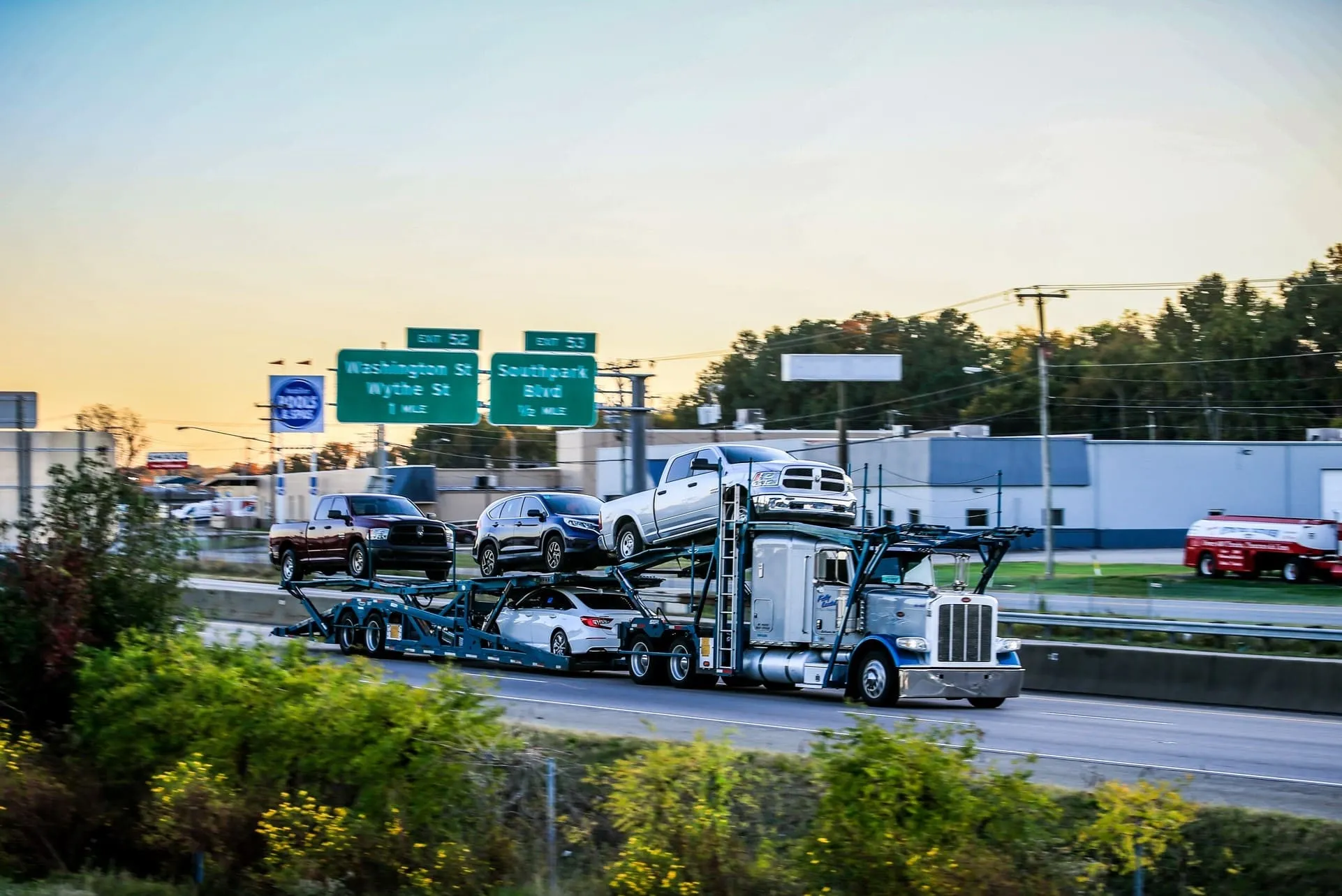 what is the difference between open and enclosed car transport